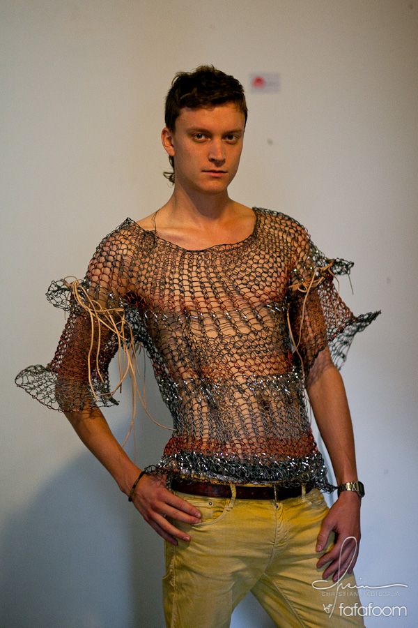A model wearing Tuan Tran's wired top